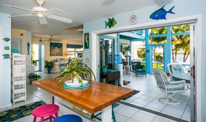 Kitchen area with views of the porch and living room - 03 - Barefoot Kai-3