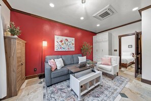 Our living room sofa converts into a comfortable queen bed!