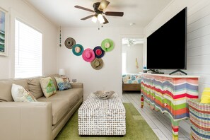 The living room is a great place to relax after a day at the beach.