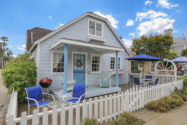 A classic Balboa Island cottage on a corner lot, centrally located.  You'll enjoy the spacious patio throughout the day!