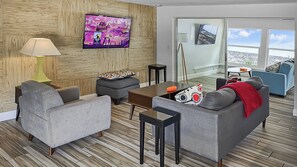 02_The First Living Space Boasts A Funky Mid-Century Modern Design