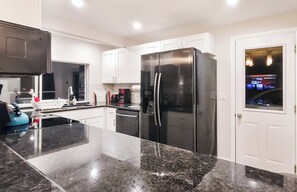 03_The Fridge Has An Ice Dispenser & Water