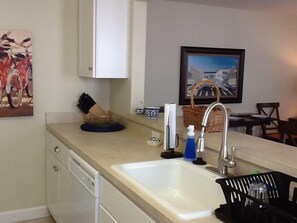 Looking from the kitchen into the Living Room with Dining Table 