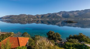 House gardens, gazebo and morning view towards Peljesac Peninsula 