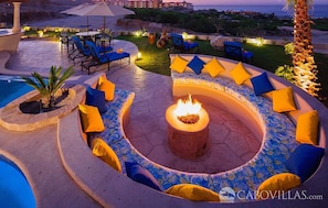 Private out door fireplace, perfect for a relaxing night overlooking the sea. 