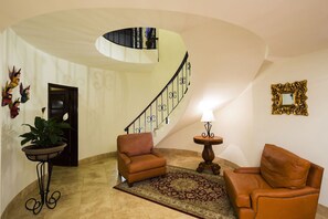 staircase downstairs leading to the downstairs pool and bedrooms. 