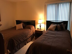 Second bedroom which includes a queen and XL twin bed