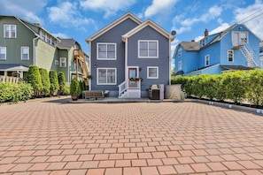 Two private parking spaces right outside your front door.