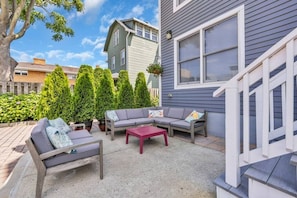 Outdoor sitting area is perfect for morning coffee or evening cocktails!