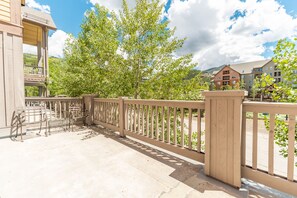 Private balcony with outdoor seating overlooking Dercum Square.