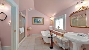 Very inviting bathroom seeing it is better. Its beautiful. 