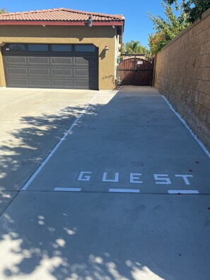 28 ft Parking space for two small cars  or one   pick up truck.