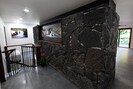 Entryway with Lava Rock Wall