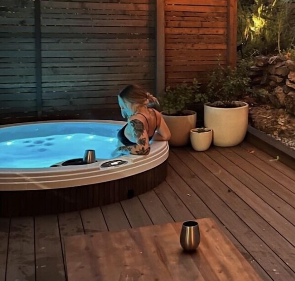 Guests will enjoy a sunken hot tub and well designed deck, all to themselves.