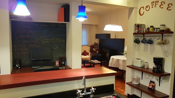 Open concept kitchen - coffee bar - desktop computer, laser printer