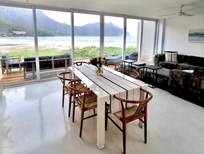 Top floor lounge with kitchenette, dining area and barbecue.