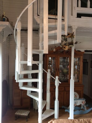 Spiral staircase leading to adults only loft