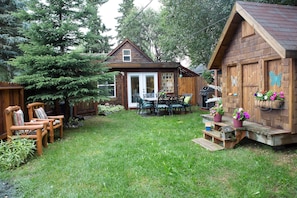 Backyard - Weber Grill, Outdoor Table, Swing Set, Fire Pit