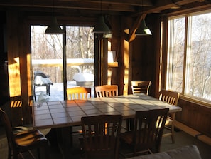 Dining Room. Sliding door with access to east deck & gas Grill