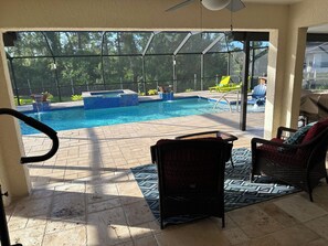 Relax on covered lani over looking the pool