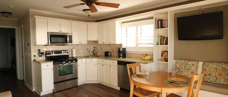 Sitting area and Kitchen with lots of counter space