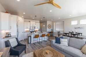 View of Kitchen - The kitchen is fully stocked with all the dishes, cookware, baking pans, and cutlery you will need for meal preparations and includes stainless steel appliances and granite counter tops.