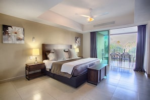 Master bedroom features a king size bed