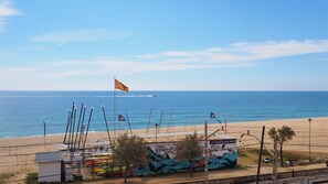 view from the terrace to the sand beach