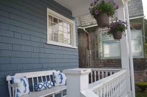 Great porch for reading and relaxing with a glass of wine