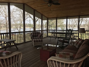 The porch has 180+ degree views of Lake Camelot.