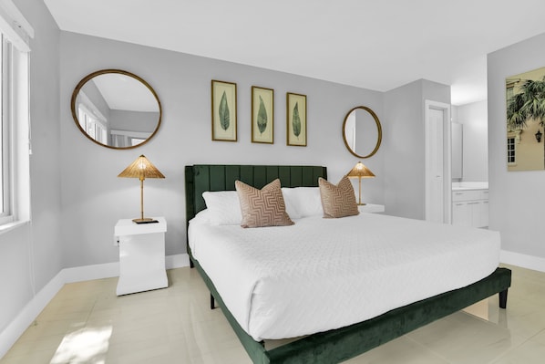 Spacious primary bedroom with king bed