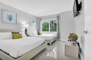 Second bedroom with two full beds