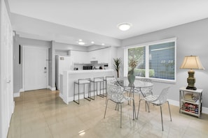 Bright and modern open concept kitchen and dining