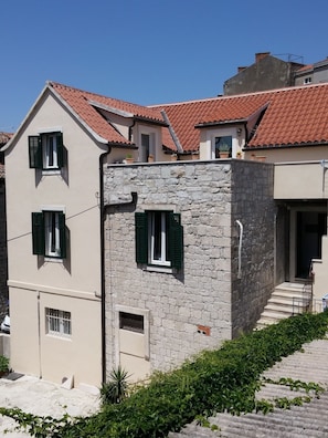 Outside view on apartment (on the last floor of the building).