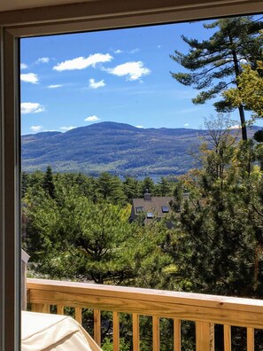 lake and mountain view from inside the home