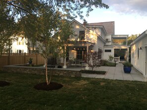 Lovely outdoor space with 10 Adirondack chairs and gas fire pit