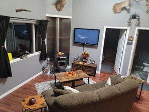 Front room. Cable TV, X box, dvd player and pellet stove (pellets provided)