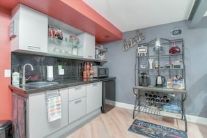 Kitchenette and beverage bar in private suite