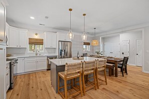 Fully stocked modern kitchen.