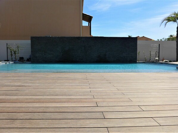 Water, Sky, Plant, Swimming Pool, Azure, Tree, Shade, Cloud, Building, Rectangle