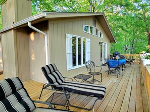 The deck provides a spacious area for lounging and enjoying the outdoors.