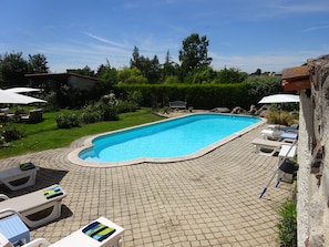 Beautiful swimming pool with sun loungers