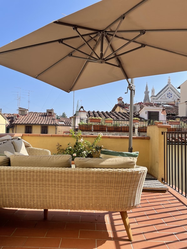 Terrace with Santa Croce Church detail on the background