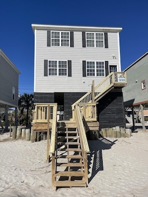 Ocean front with only steps to the water's edge.