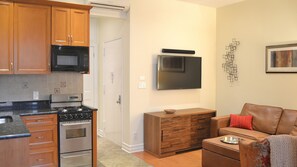 Living Room with Sofa Bed, IP TV, Play Station, Home Theater System & Entrance