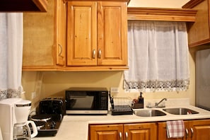 Fully equipped kitchen has a lot of counter space and has new appliances!