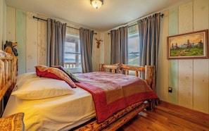 Main level bedroom with Queen bed.