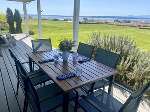 Covered dining area can be enjoyed no matter what the weather is doing!