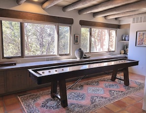 New 12' shuffleboard table in living room alcove