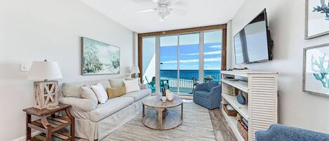 Living room with large balcony. Gorgeous view of the Gulf of Mexico.